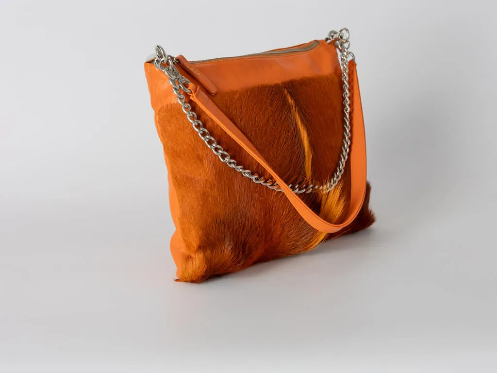 Multiway Springbok Handbag in Orange with a Fan