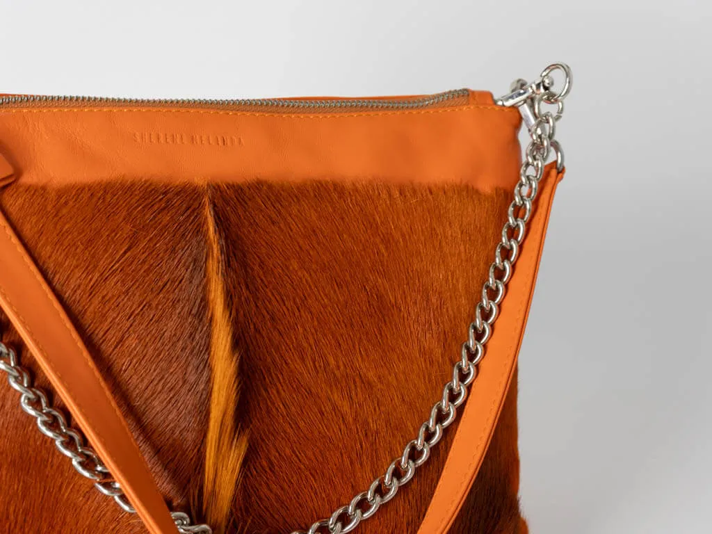 Multiway Springbok Handbag in Orange with a Fan
